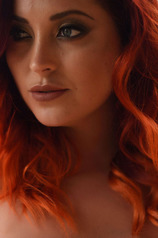 Busty Redhead Babe Lucy Vixen